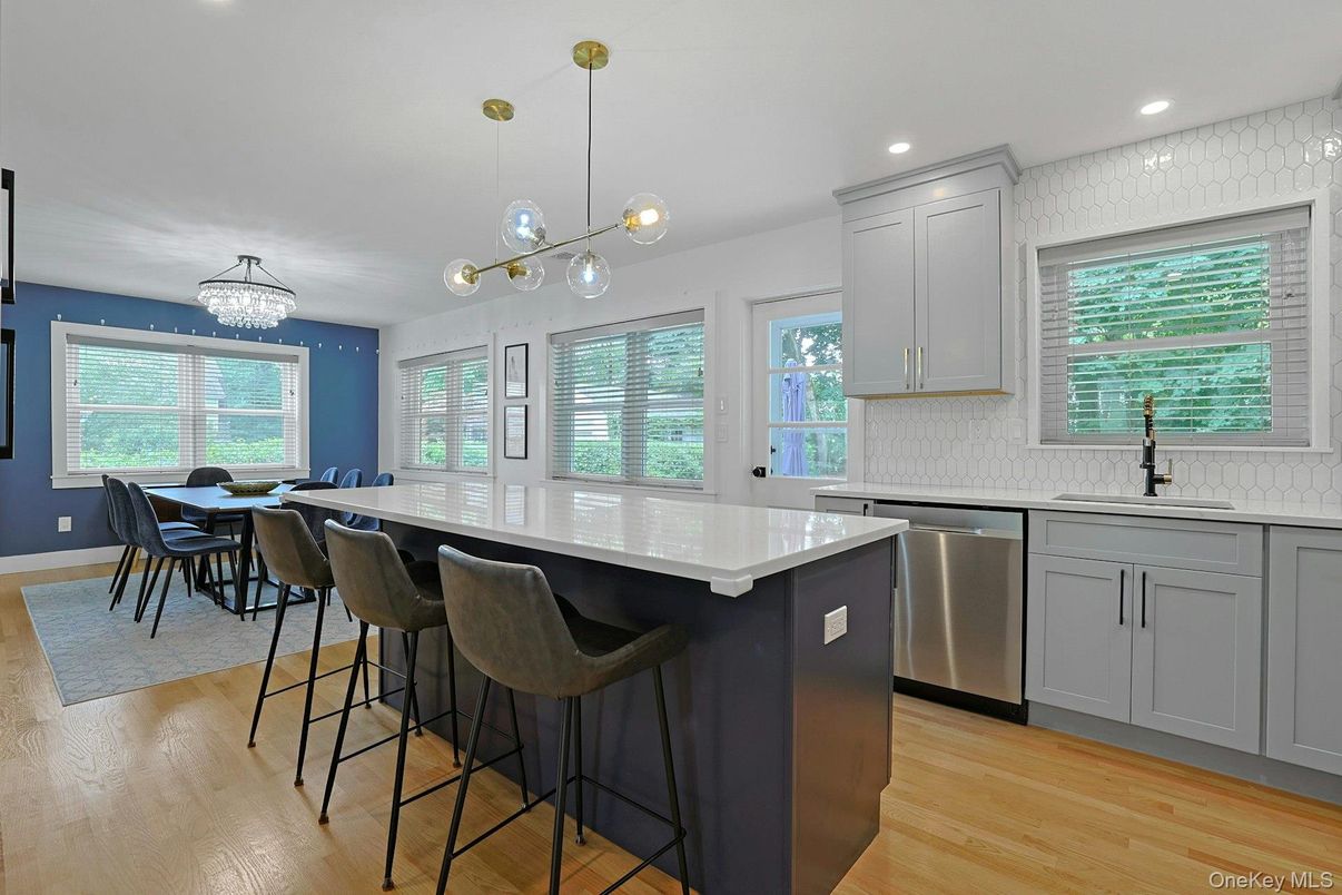 Dining room, Interior, Kitchen, Pendant Lights, Recessed Lighting, Stainless Steel Appliances, Wood Texture Flooring