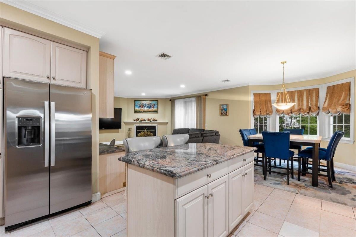 Dining room, Fireplace, Interior, Kitchen, Pendant Lights, Recessed Lighting, Stainless Steel Appliances