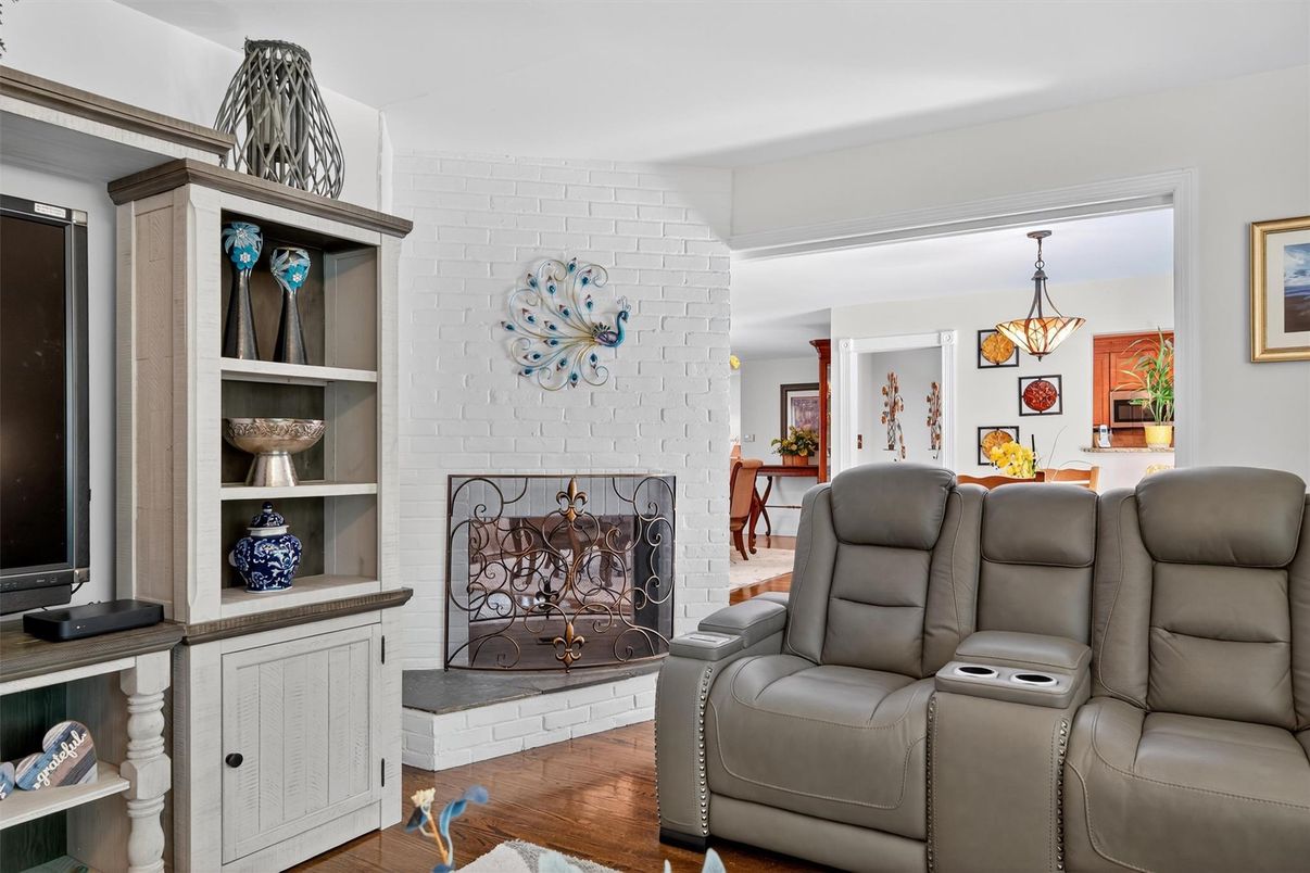 Home Theatre Room, Fireplace, Interior, Pendant Lights, Stone Walls, Wood Texture Flooring