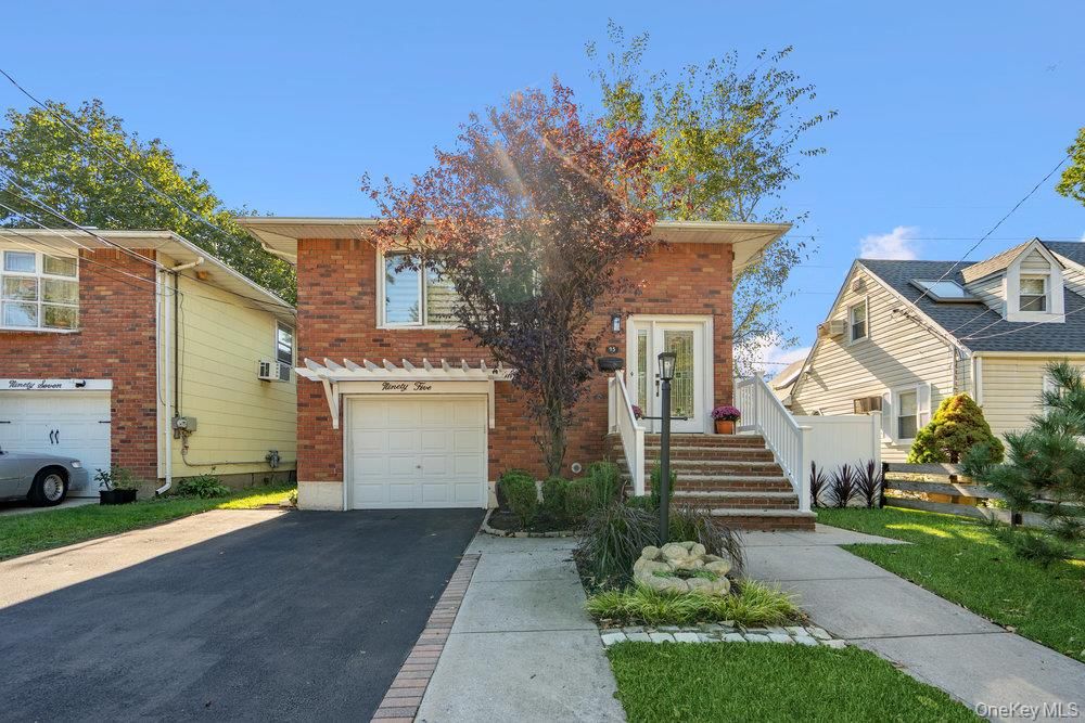 Attached, Exterior, Facade, Brick Facade, Raised Ranch