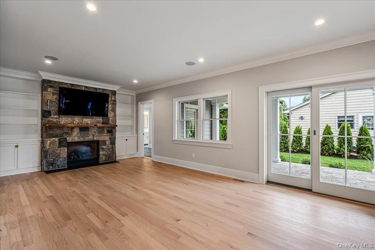 Empty room, Fireplace, Interior, Recessed Lighting, Wood Texture Flooring