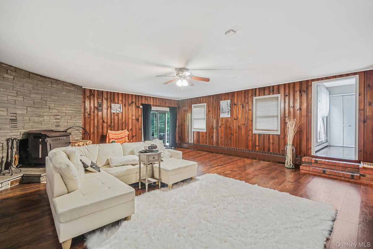 Fireplace, Interior, Living room, Stone Walls, Wood Texture Flooring, Wooden Walls
