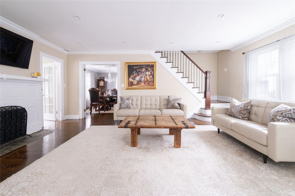 Dining room, Fireplace, Interior, Living room, Recessed Lighting, Wood Texture Flooring