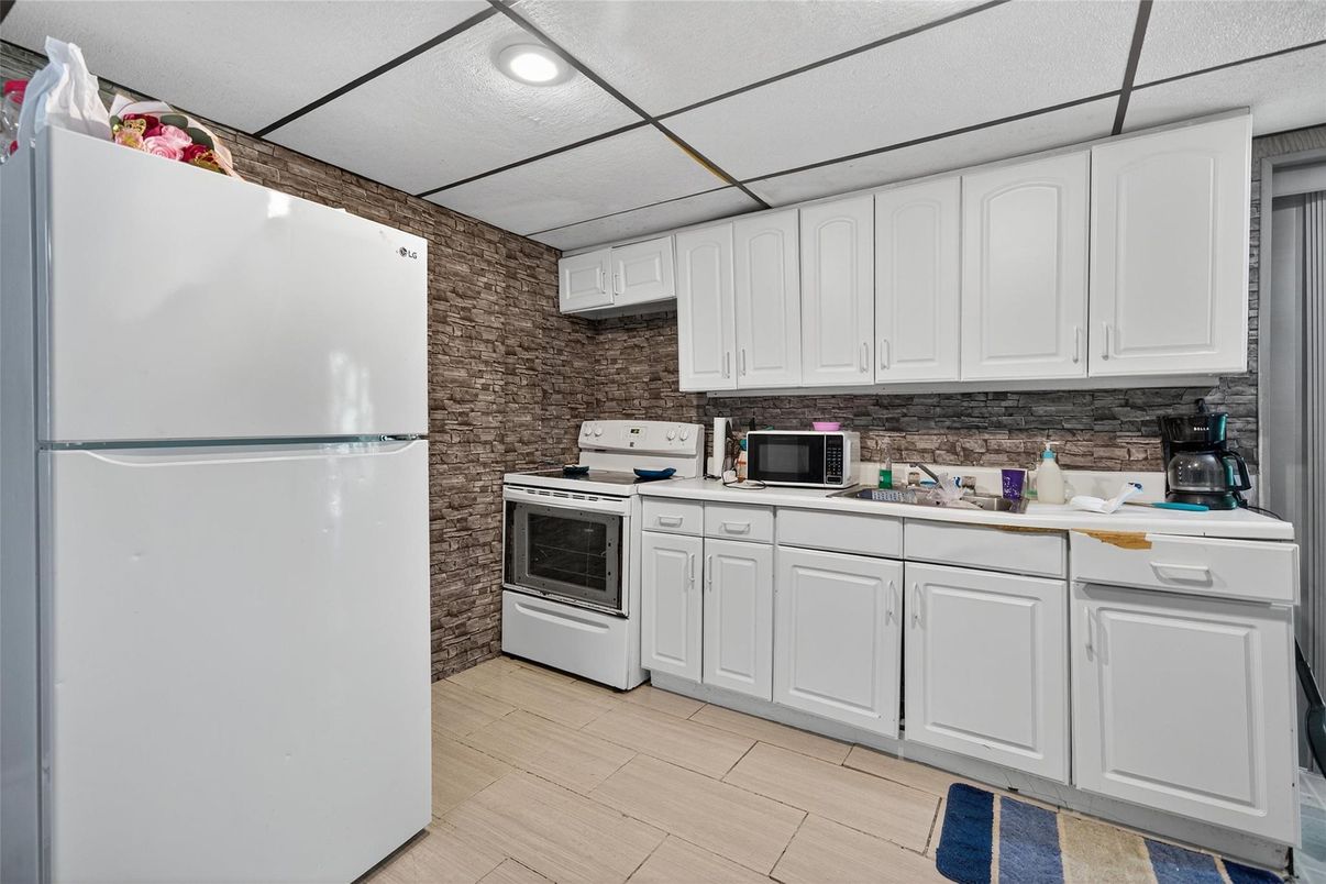 Interior, Kitchen, Recessed Lighting, Stone Walls, Wood Texture Flooring