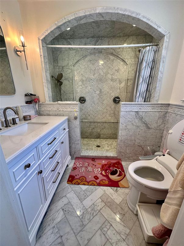 Bathroom, Dual Sink Vanities, Glass Shower, Interior, Marble, Marble Walls