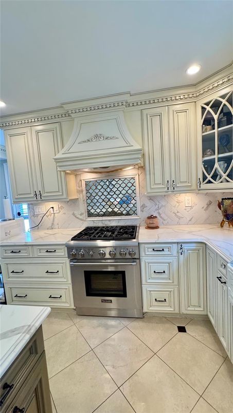 Interior, Kitchen, Marble Walls, Recessed Lighting, Stainless Steel Appliances
