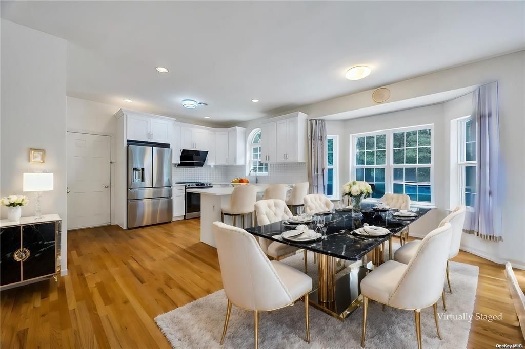 Dining room, Interior, Kitchen, Recessed Lighting, Stainless Steel Appliances, Wood Texture Flooring