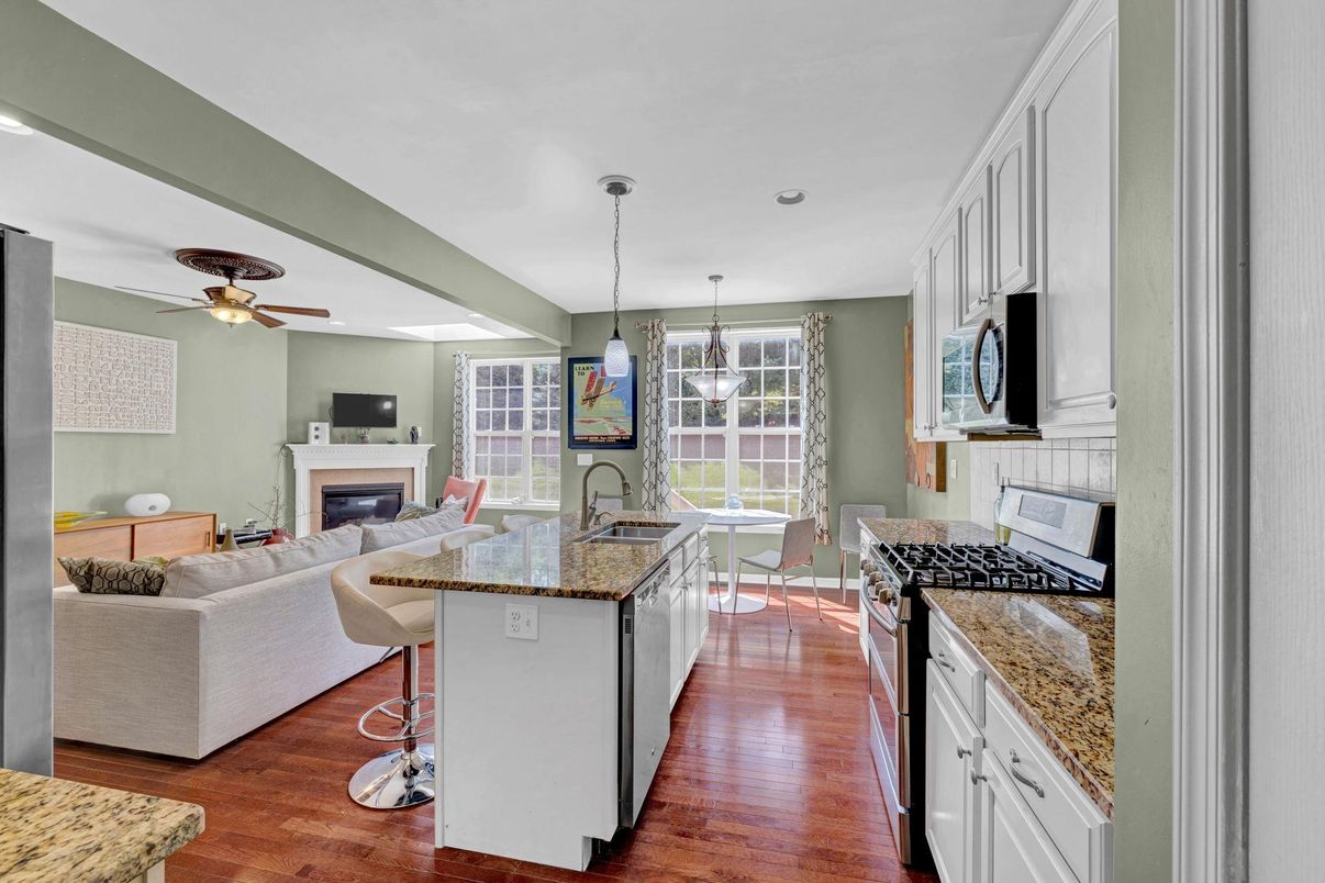 Dining room, Fireplace, Interior, Kitchen, Living room, Pendant Lights, Wood Texture Flooring