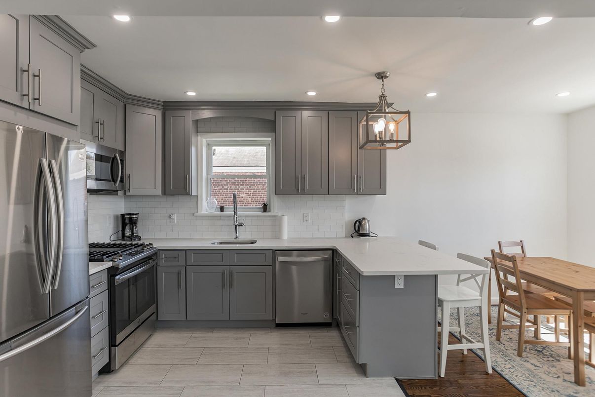 Dining room, Interior, Kitchen, Pendant Lights, Recessed Lighting, Stainless Steel Appliances, Wood Texture Flooring