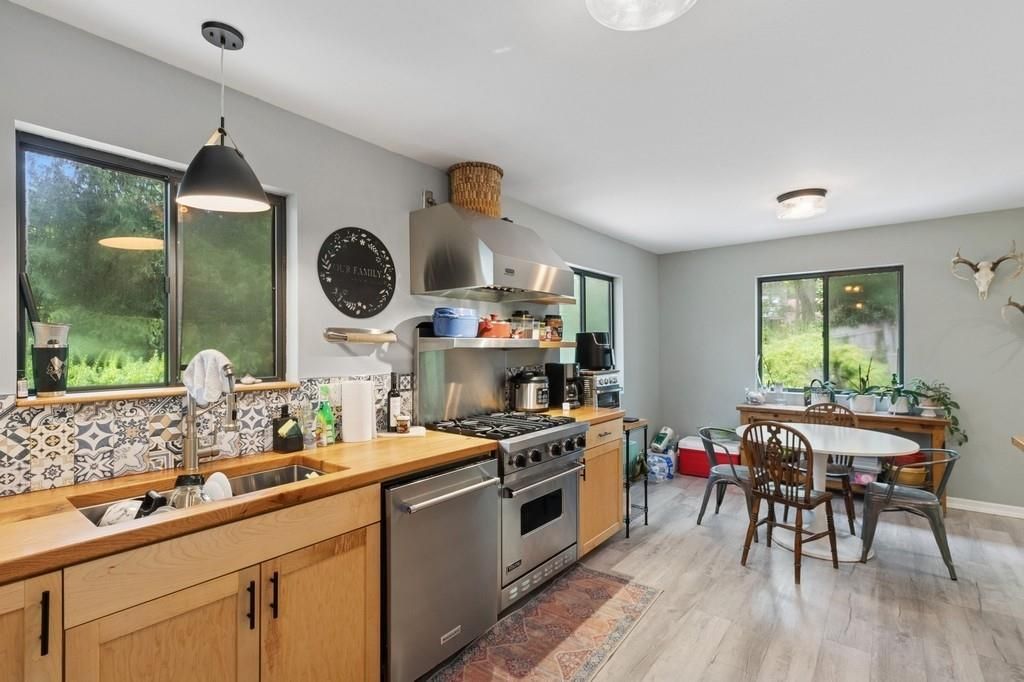 Dining room, Interior, Kitchen, Pendant Lights, Stainless Steel Appliances, Wood Texture Flooring