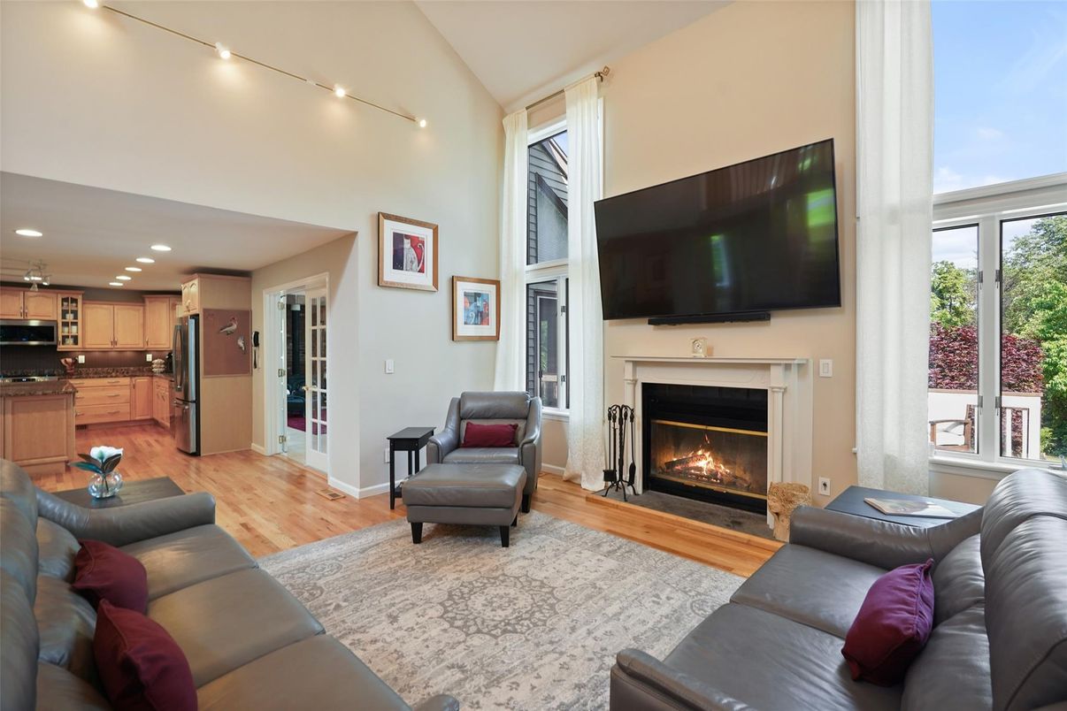 Fireplace, Interior, Kitchen, Living room, Recessed Lighting, Stainless Steel Appliances, Wood Texture Flooring