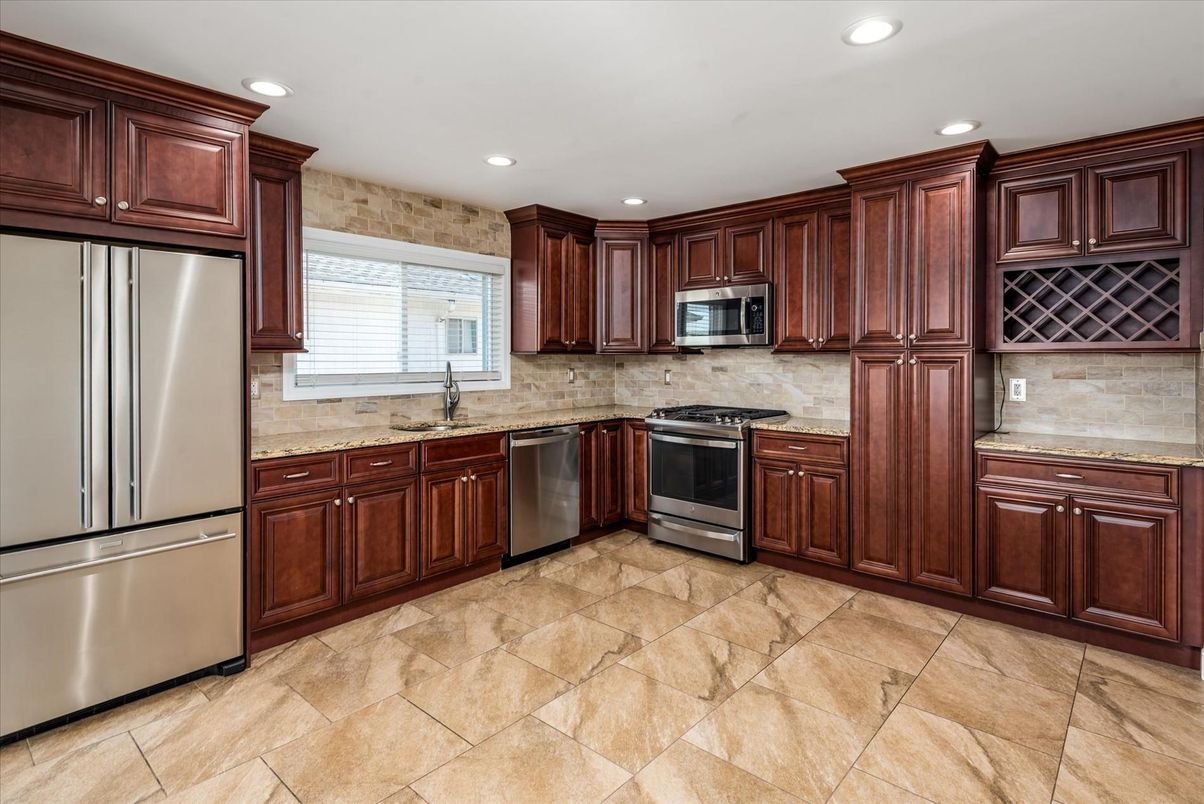 Interior, Kitchen, Recessed Lighting, Stainless Steel Appliances, Stone Walls