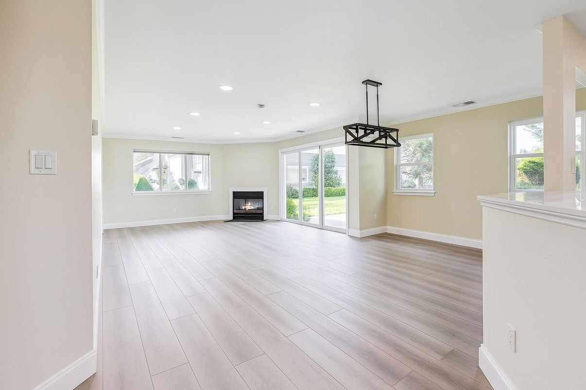 Empty room, Fireplace, Interior, Pendant Lights, Recessed Lighting, Wood Texture Flooring