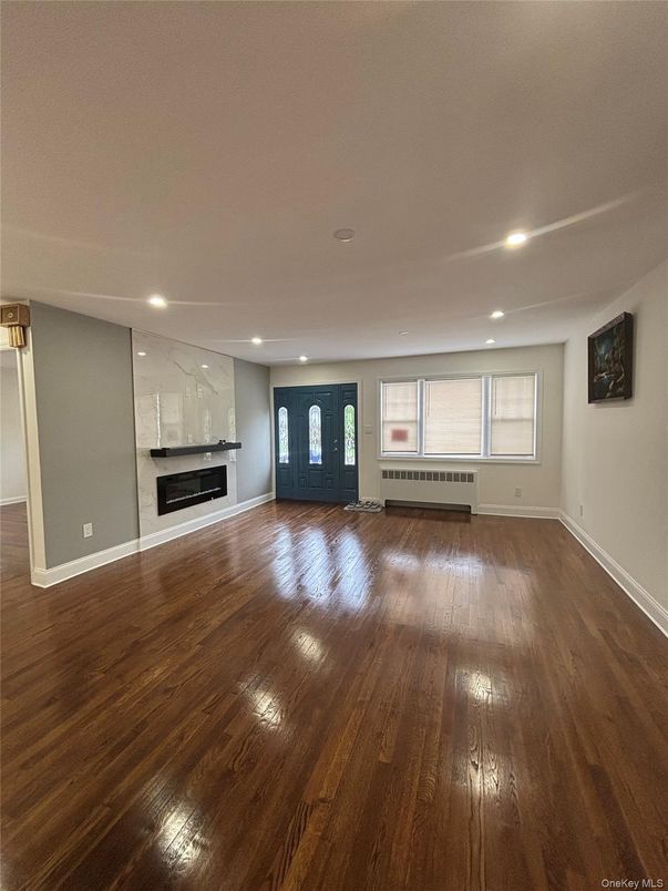 Empty room, Fireplace, Interior, Recessed Lighting, Wood Texture Flooring