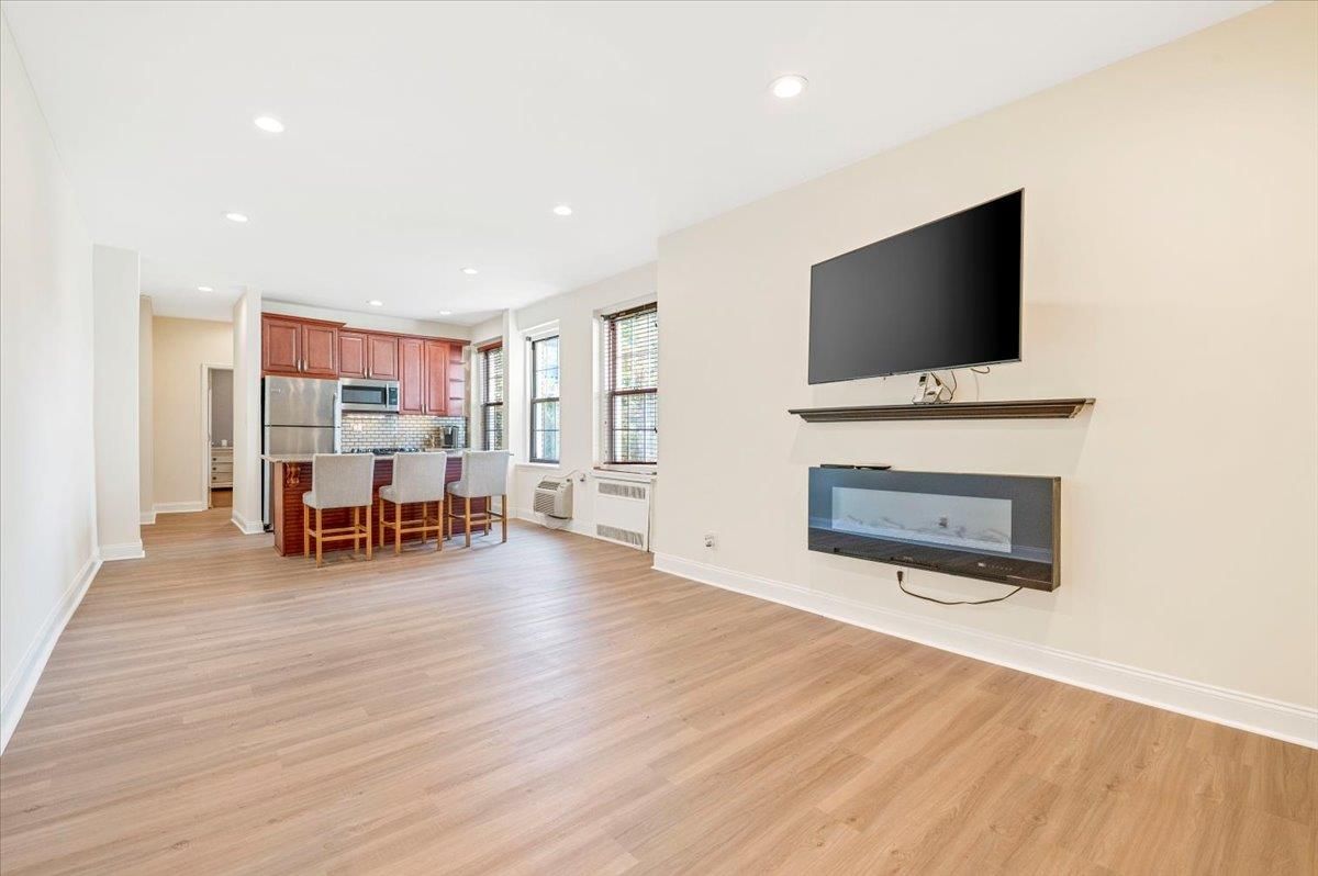 Dining room, Interior, Kitchen, Recessed Lighting, Stainless Steel Appliances, Wood Texture Flooring
