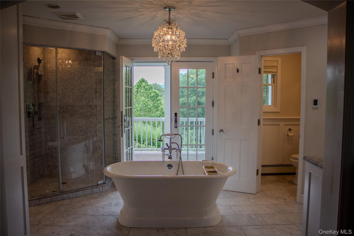 Bathroom, Chandelier, Free Standing Baths, Glass Shower, Interior, Marble, Marble Walls