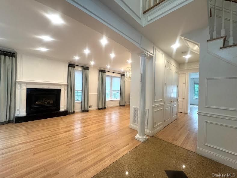 Empty room, Fireplace, Interior, Recessed Lighting, Wood Texture Flooring