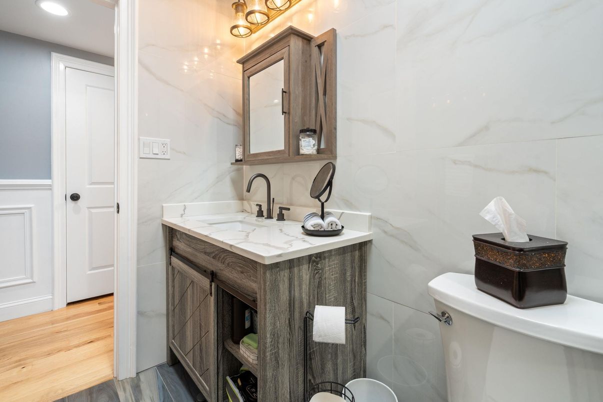 Bathroom, Interior, Marble Walls, Recessed Lighting, Wood Texture Flooring
