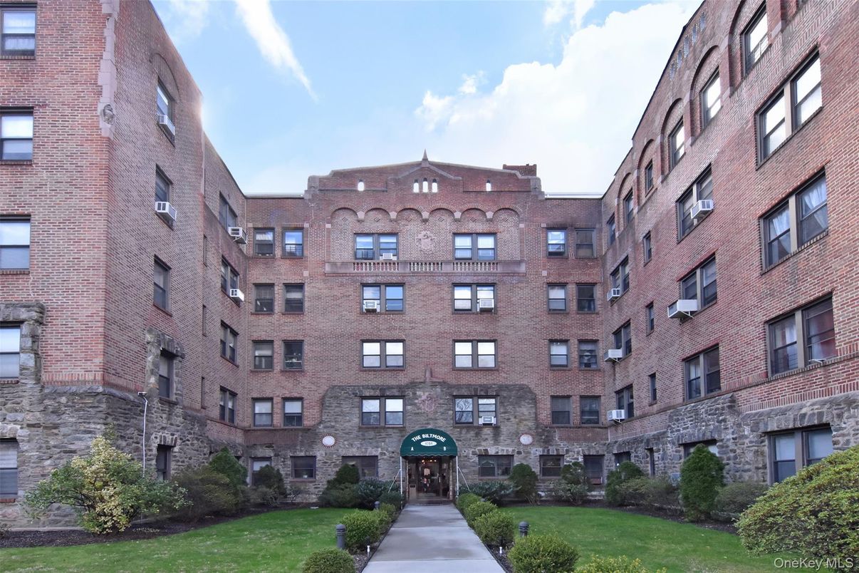 Exterior, Facade, Brick Facade, Condo Building