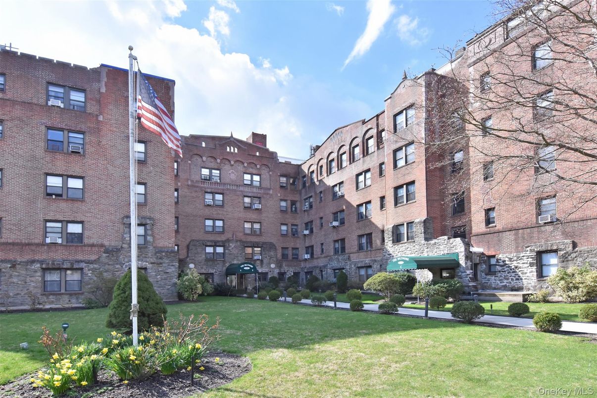 Backyard, Exterior, Facade, Brick Facade, Condo Building