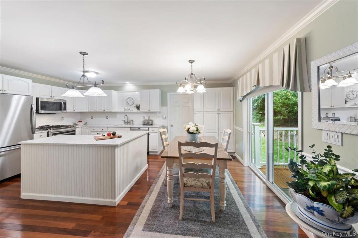 Dining room, Interior, Kitchen, Pendant Lights, Stainless Steel Appliances, Wood Texture Flooring