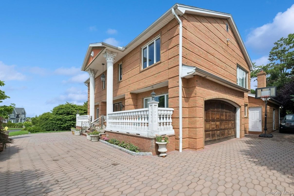 Attached, Exterior, Facade, Brick Facade, None