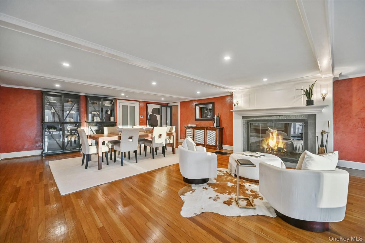 Dining room, Fireplace, Interior, Living room, Recessed Lighting, Wood Texture Flooring