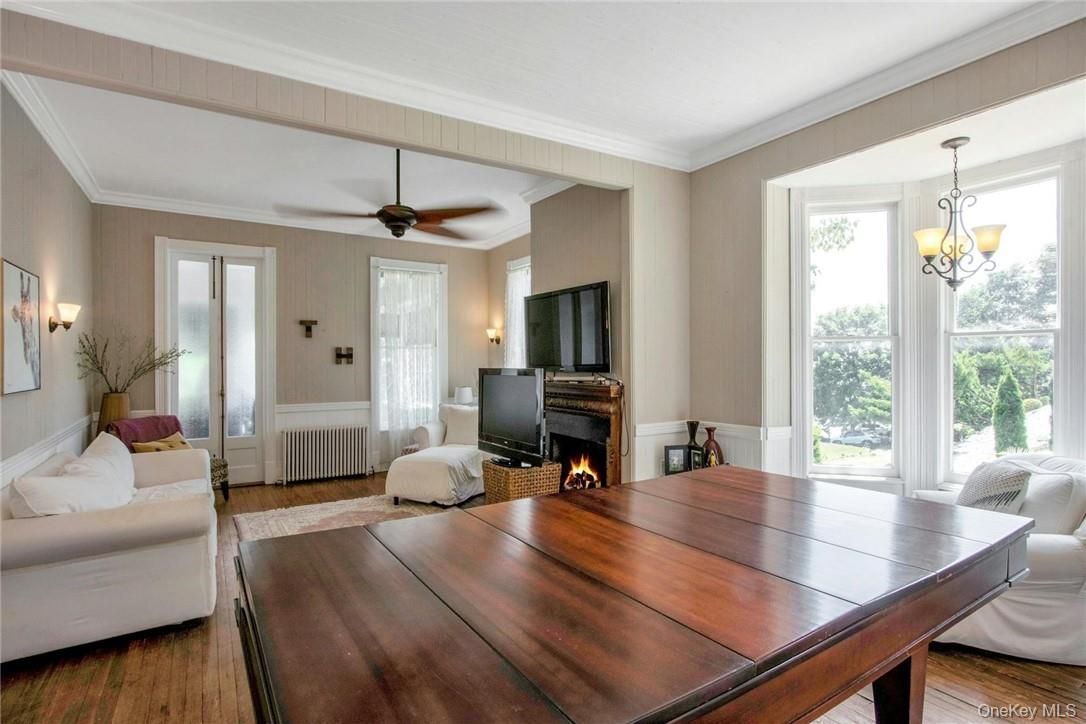 Dining room, Fireplace, Interior, Living room, Pendant Lights, Wood Texture Flooring