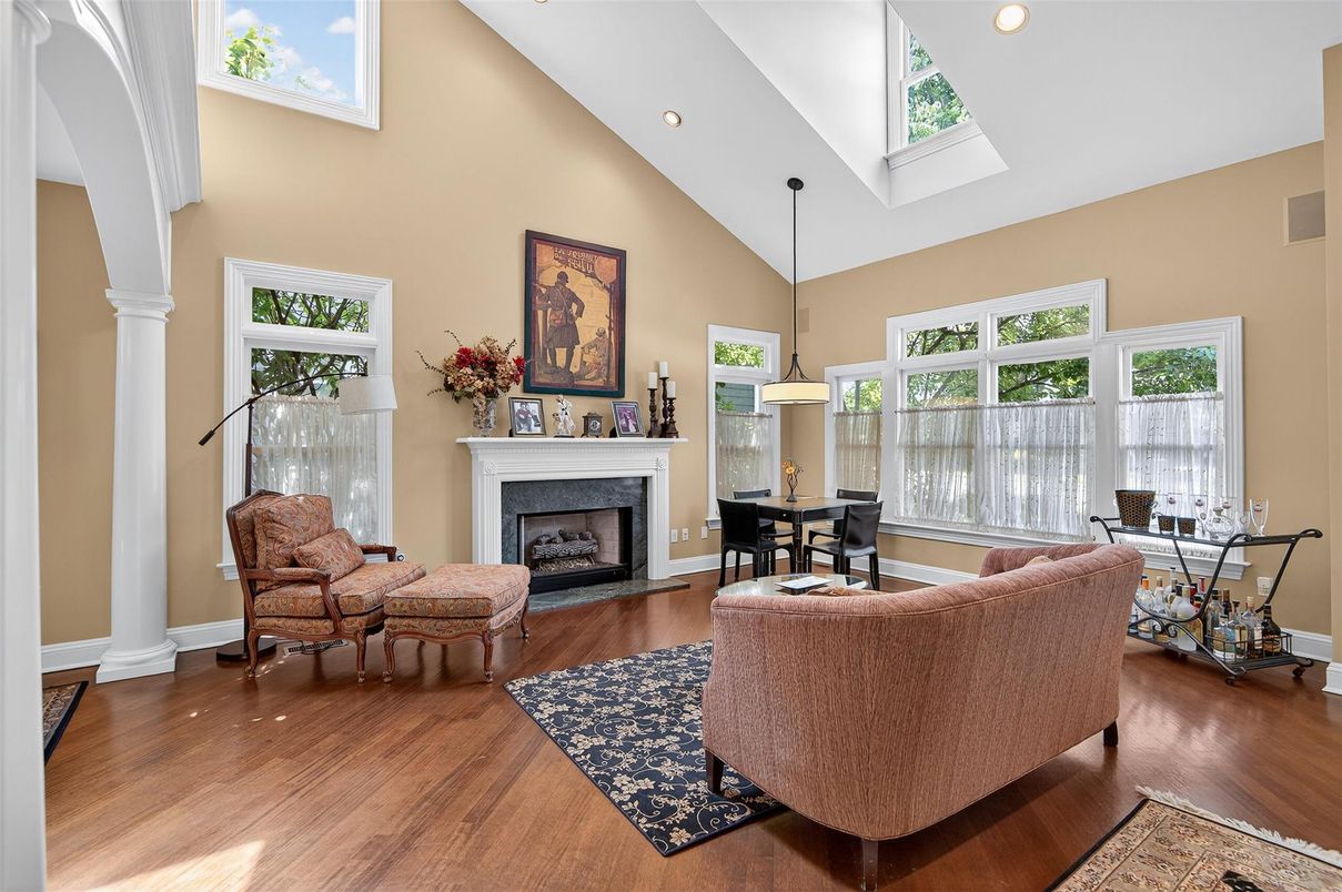 Dining room, Fireplace, Interior, Living room, Pendant Lights, Recessed Lighting, Wood Texture Flooring