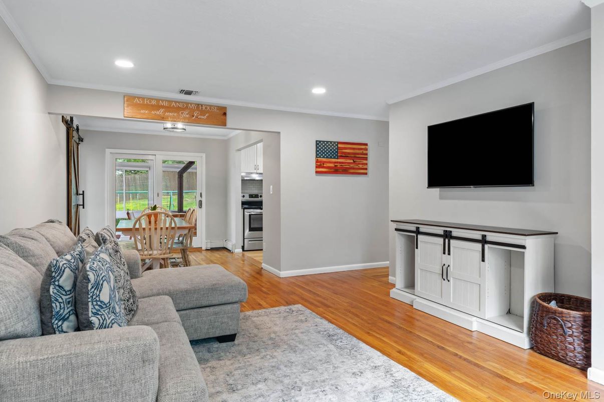 Dining room, Interior, Kitchen, Living room, Recessed Lighting, Stainless Steel Appliances, Wood Texture Flooring