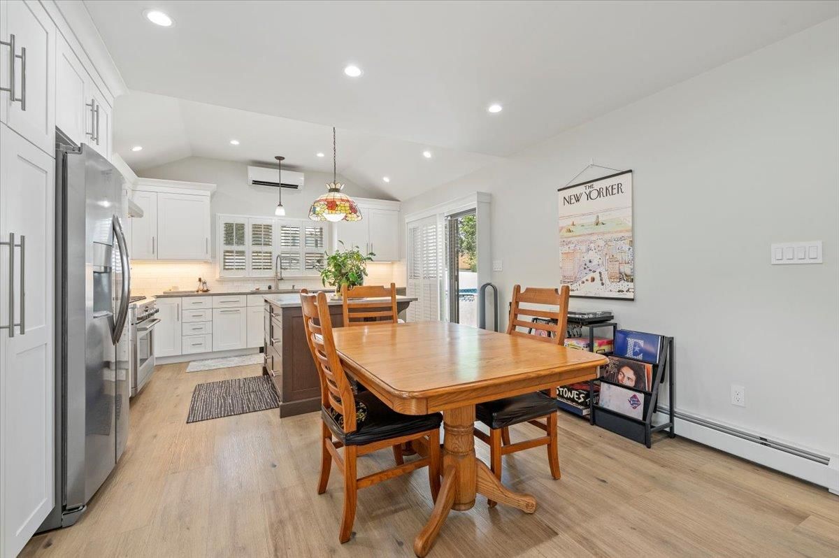 Dining room, Interior, Kitchen, Pendant Lights, Recessed Lighting, Stainless Steel Appliances, Wood Texture Flooring