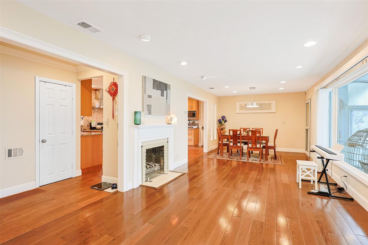 Dining room, Fireplace, Interior, Pendant Lights, Recessed Lighting, Wood Texture Flooring