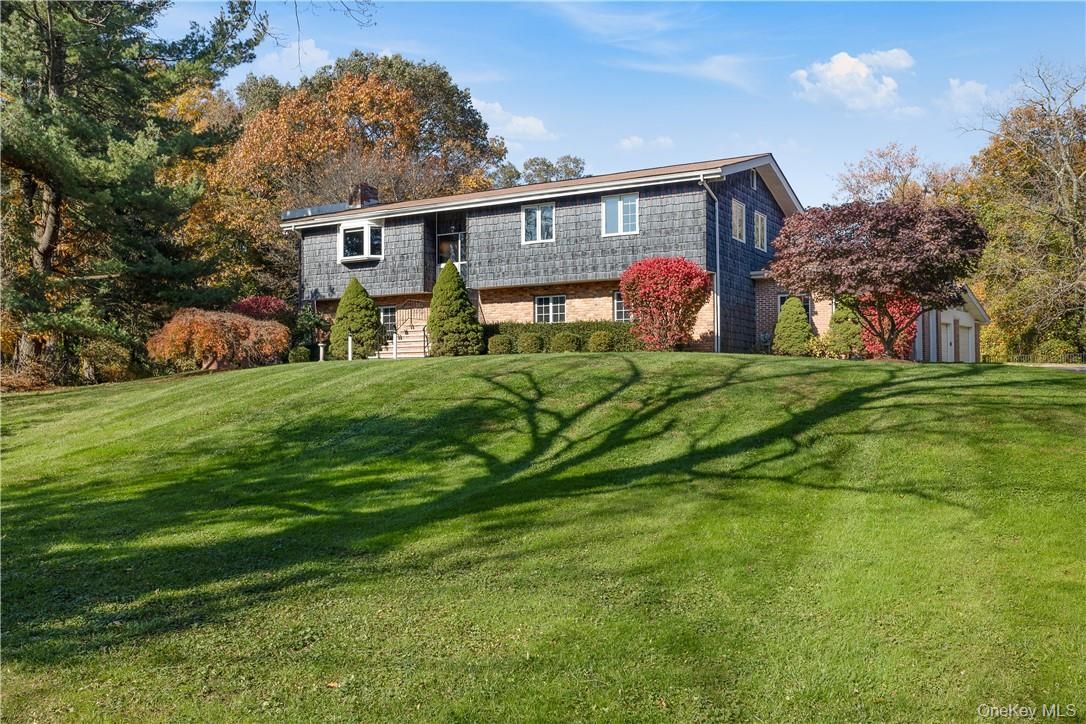 Attached, Backyard, Exterior, Facade, Brick Facade, Split Level