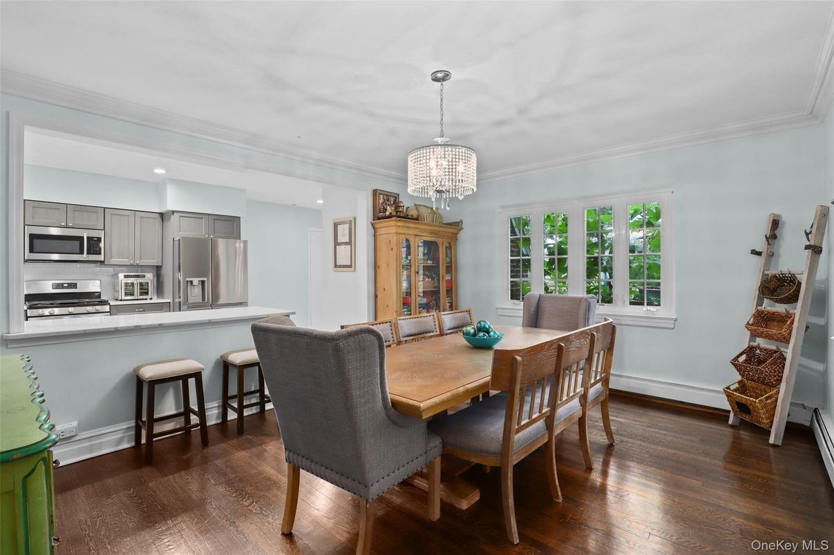 Chandelier, Dining room, Interior, Kitchen, Recessed Lighting, Stainless Steel Appliances, Wood Texture Flooring