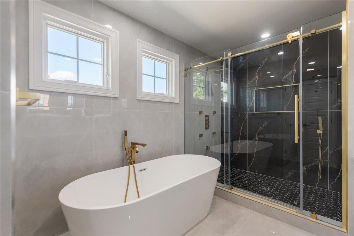 Bathroom, Free Standing Baths, Glass Shower, Interior, Marble Walls, Recessed Lighting