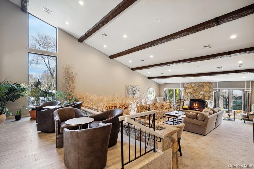 Fireplace, Interior, Living room, Recessed Lighting, Stone Walls, Wooden Beams, Wood Texture Flooring