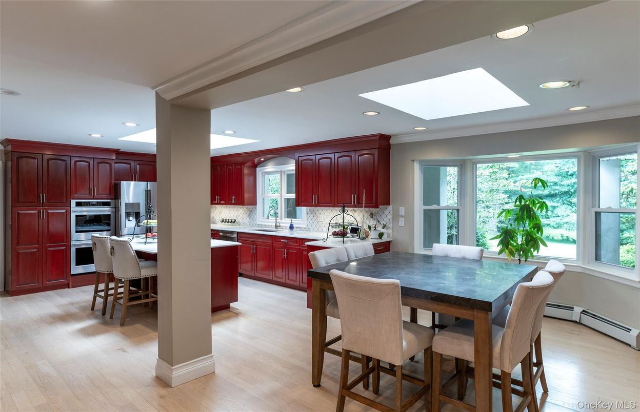 Dining room, Interior, Kitchen, Recessed Lighting, Stainless Steel Appliances, Wood Texture Flooring