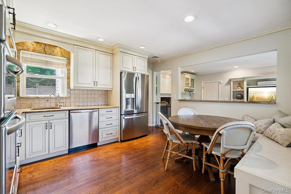 Dining room, Interior, Kitchen, Recessed Lighting, Stainless Steel Appliances, Wood Texture Flooring