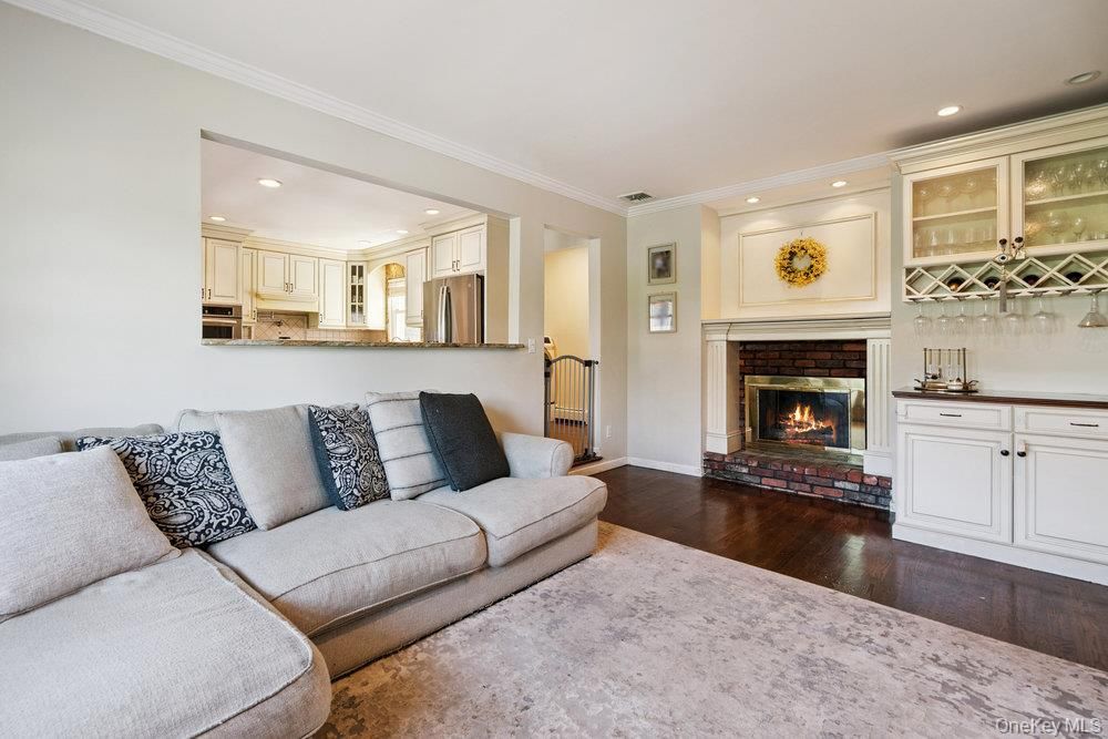 Fireplace, Interior, Kitchen, Living room, Recessed Lighting, Wood Texture Flooring