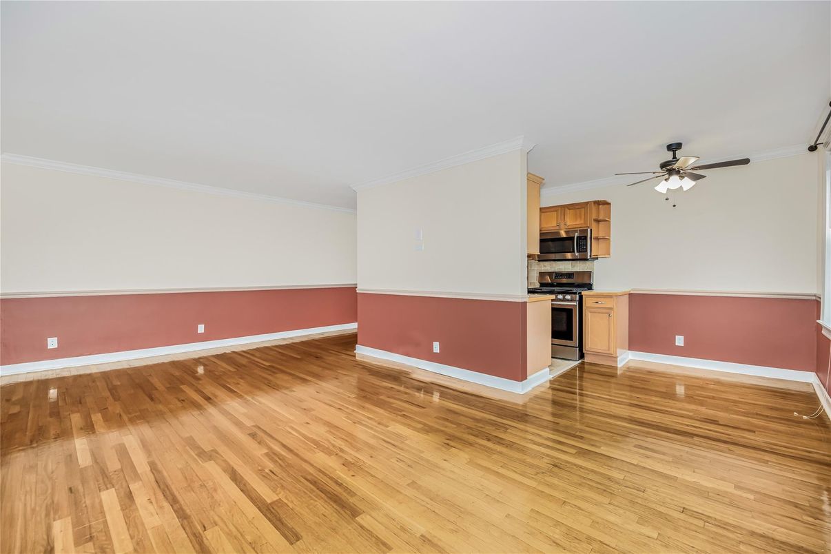 Empty room, Interior, Kitchen, Stainless Steel Appliances, Wood Texture Flooring