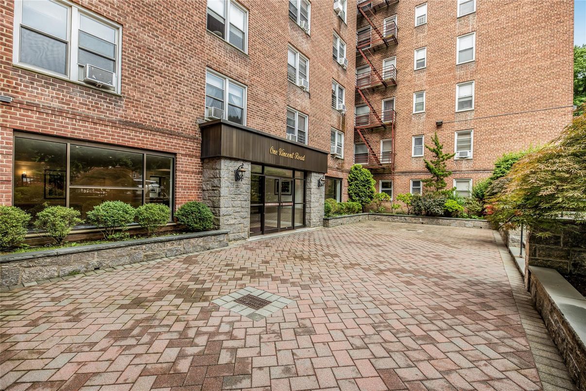 Exterior, Facade, Brick Facade, Condo Building