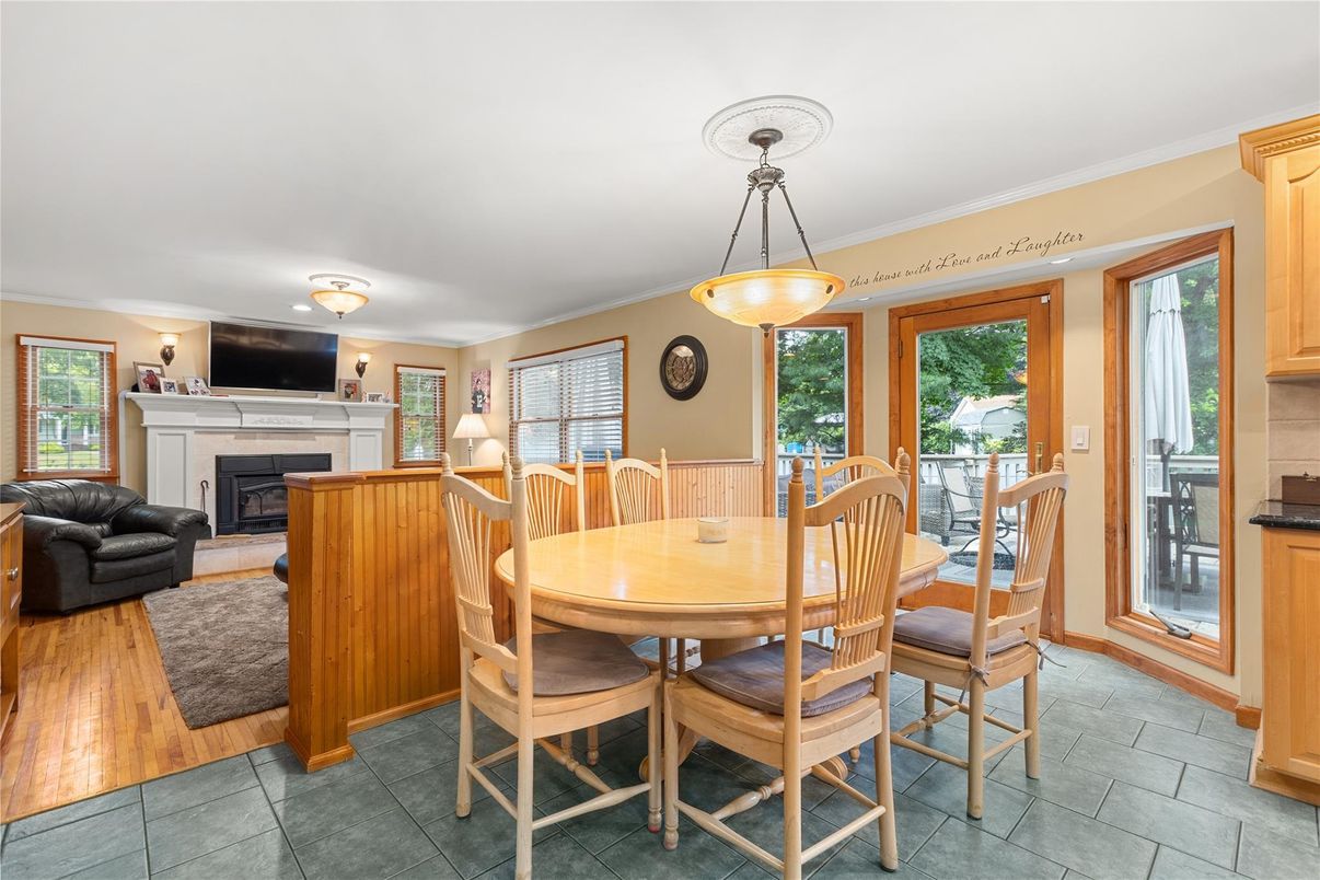 Dining room, Fireplace, Interior, Pendant Lights, Wood Texture Flooring