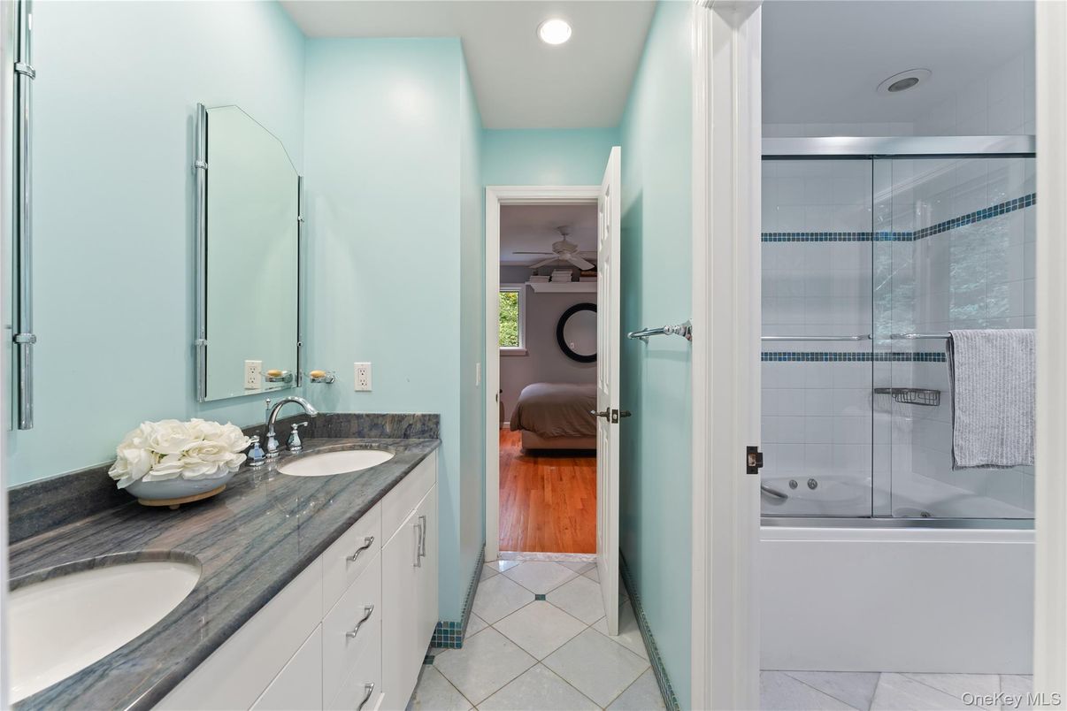 Bathroom, Bedroom, Dual Sink Vanities, Glass Shower, Interior, Recessed Lighting, Wood Texture Flooring