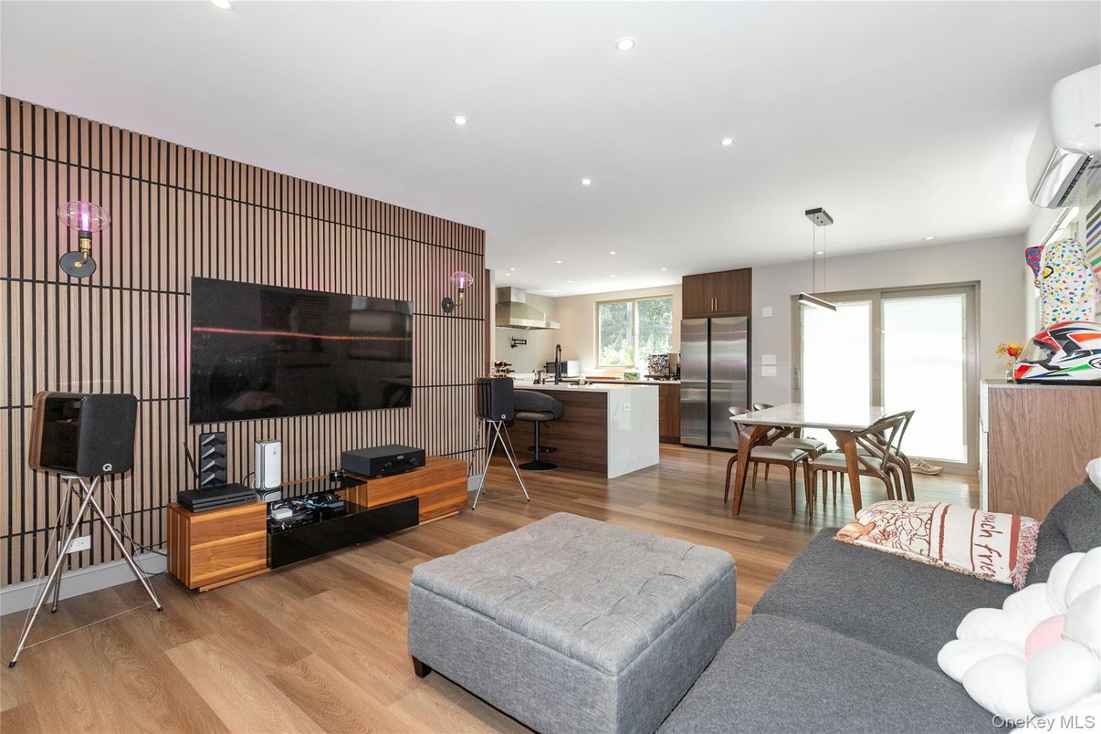 Dining room, Interior, Kitchen, Living room, Pendant Lights, Recessed Lighting, Stainless Steel Appliances, Wood Texture Flooring