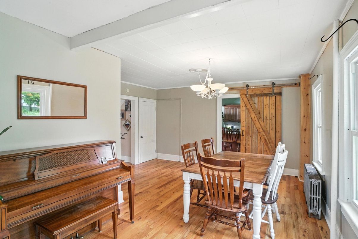 Chandelier, Dining room, Interior, Piano, Wood Texture Flooring