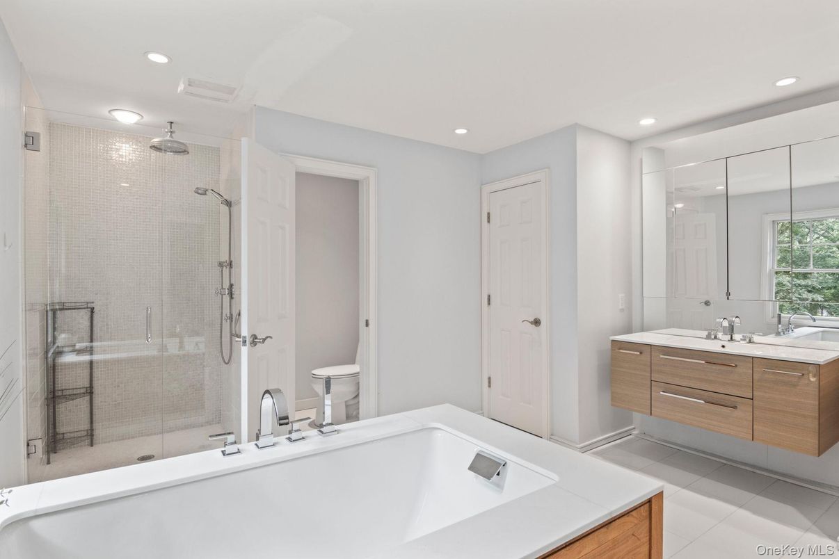 Bathroom, Dual Sink Vanities, Glass Shower, Interior, Recessed Lighting