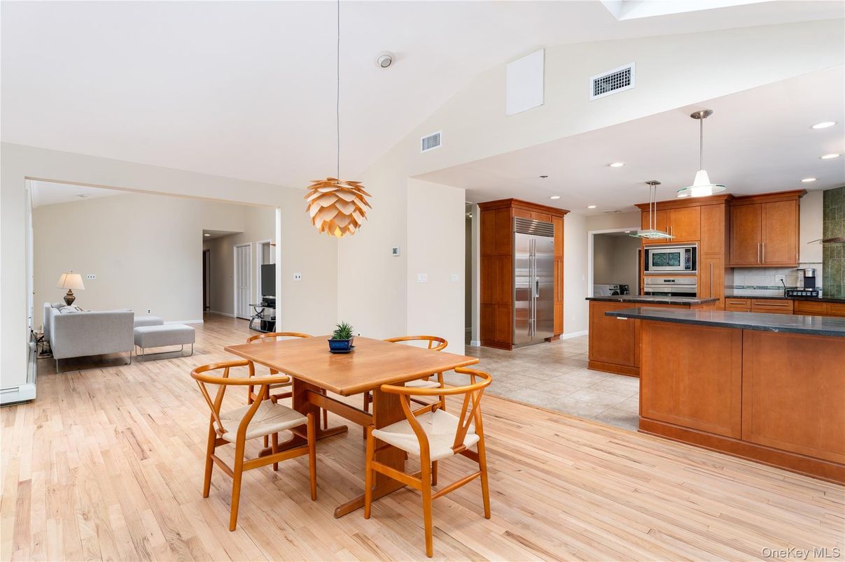 Dining room, Interior, Kitchen, Living room, Pendant Lights, Recessed Lighting, Stainless Steel Appliances, Wood Texture Flooring