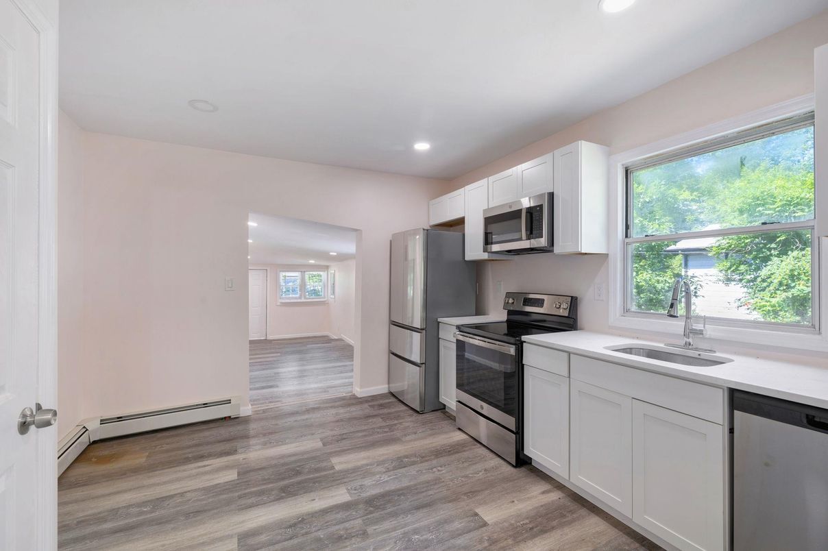 Interior, Kitchen, Recessed Lighting, Stainless Steel Appliances, Wood Texture Flooring