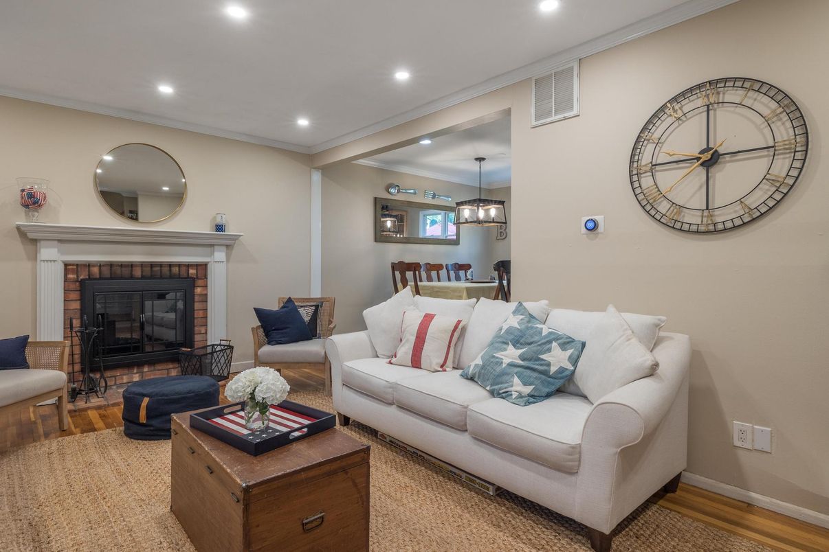 Dining room, Fireplace, Interior, Living room, Pendant Lights, Recessed Lighting, Wood Texture Flooring