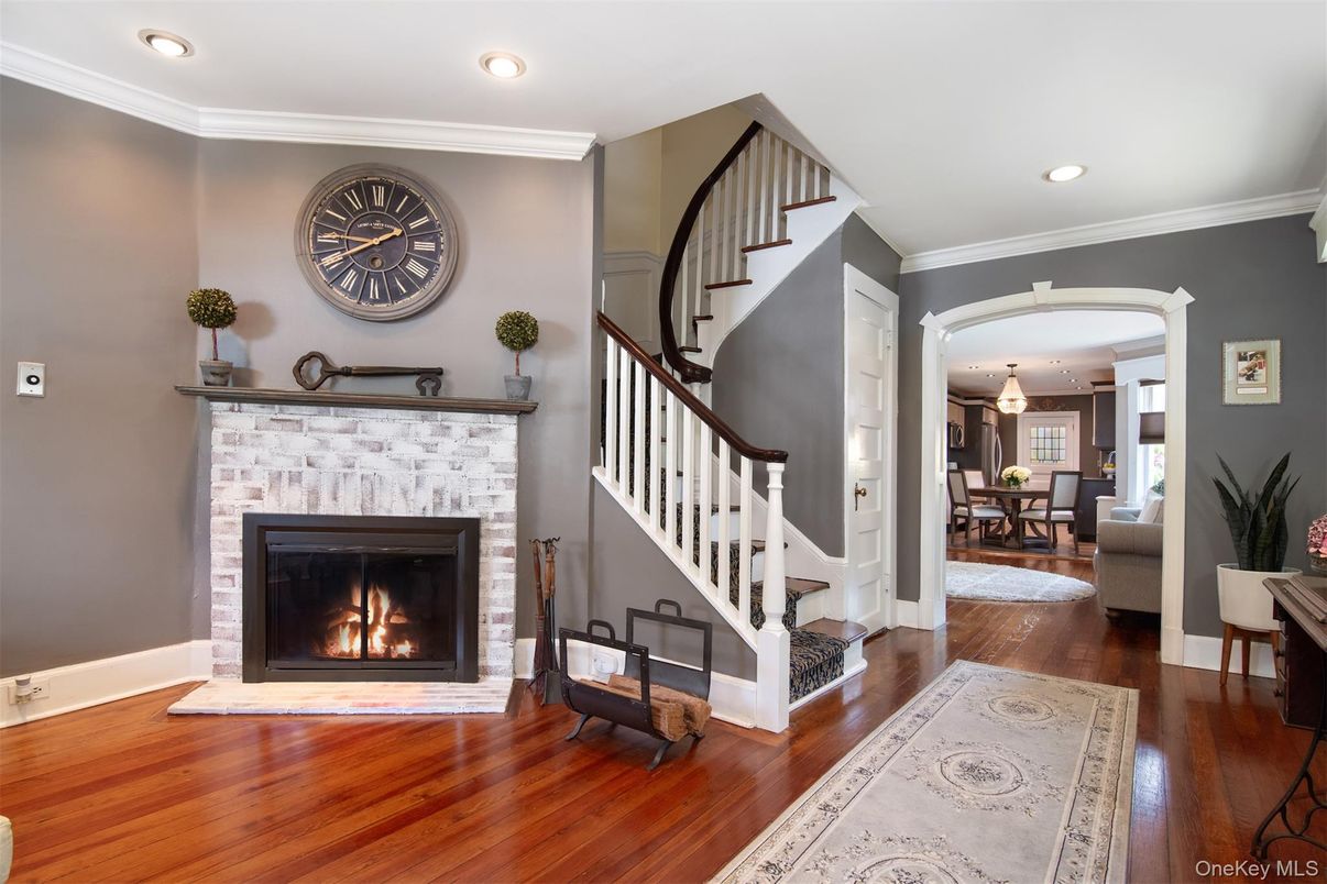 Dining room, Fireplace, Interior, Pendant Lights, Recessed Lighting, Wood Texture Flooring